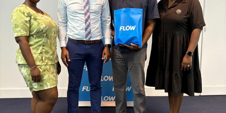FLOW makes donation to the Antigua State College