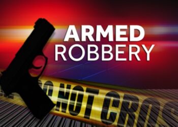 Two men have been charged with aggravated robbery