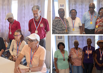 Members of Library Senior Citizen Club test skills in domino contests
