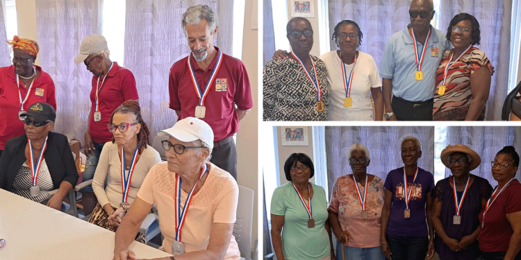Members of Library Senior Citizen Club test skills in domino contests