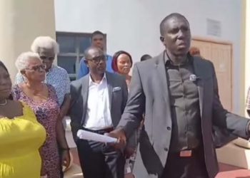 Opposition Leader escorted from parliament chambers