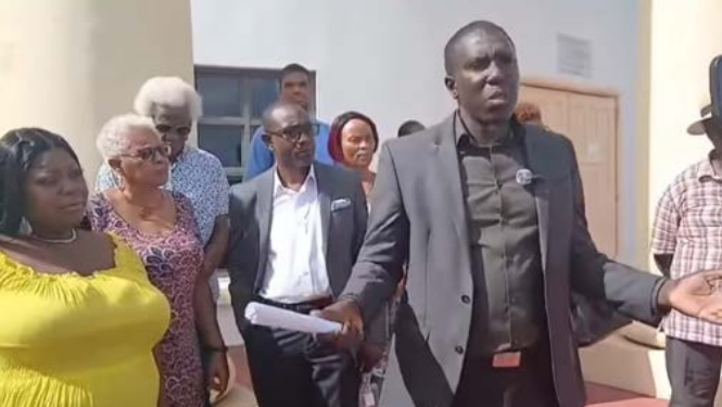 Opposition Leader escorted from parliament chambers