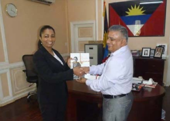 Indian High Commission presents book on Yoga to Lady Williams