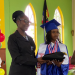 Community activist secures laptop for top performing student