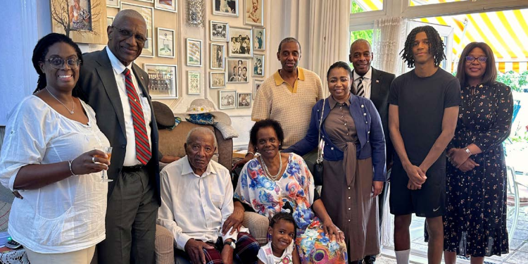 Senior government officials visit Antiguan/UK couple on milestone anniversary